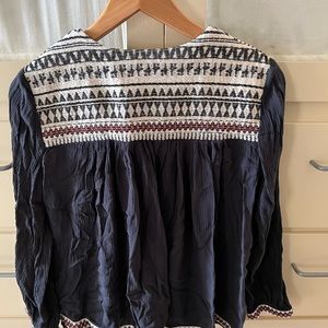 H&M embroidered seersucker blouse.